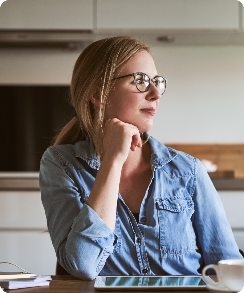 girl with glasses thinking